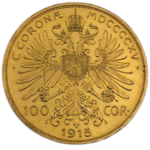 Vorderseite der österreichischen 100-Kronen-Münze aus dem Jahr 1915. Ein Wappenadler ist umgeben von der Inschrift "Coronae MDCCCCXV". Darunter "100 COR." und "1915"